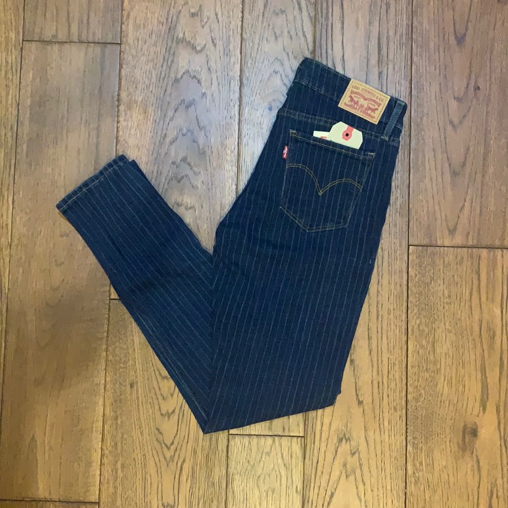 Pin stripe mid rise skinny jeans